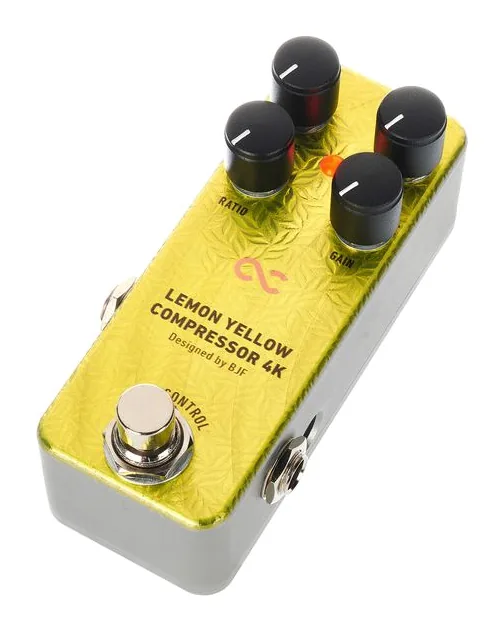 One Control Lemon Yellow Compressor 4K fotografato frontalmente